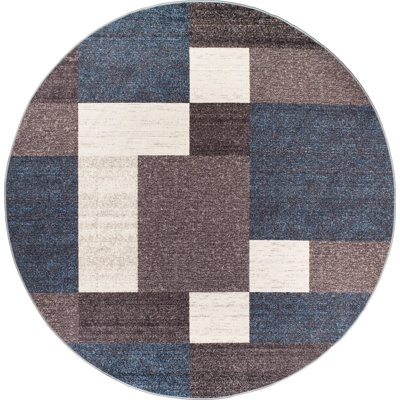 Tapis bleu touffeté à motif géométrique Allyne