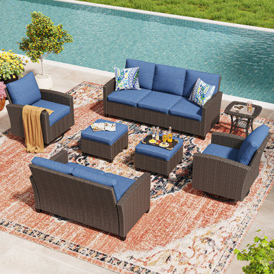 Ensemble de conversation d'extérieur en osier 7 personnes avec coussins, causeuses, chaises berçantes pivotantes, repose-pieds