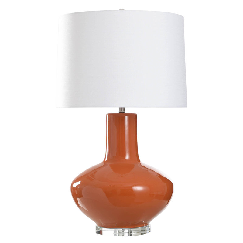 Lampe de table Moundridge Aniston - corps en céramique finition orange avec base en cristal - abat-jour rigide