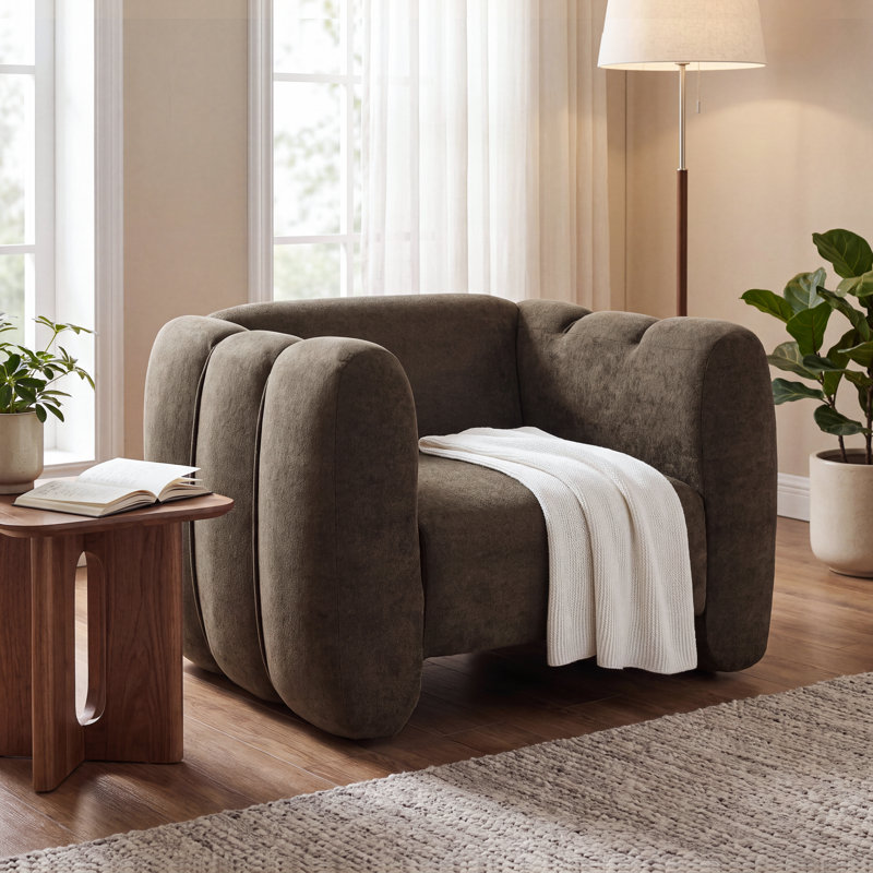 Fauteuil Maravilla moderne rembourré avec silhouette massive, surpiqûres en canal et rembourrage moelleux, Marron foncé