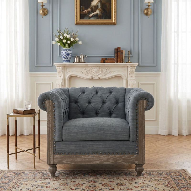 Fauteuil club capitonné