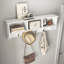 Portemanteau mural blanc avec 4 crochets doubles