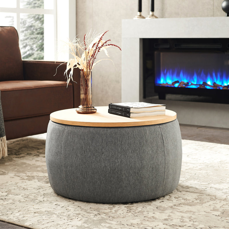 Rangement rond - 2 po 1. Fonctionne comme table de bout et. Revêtement en lin gris foncé. Fait à la main. 25,5 po x 25,5 po x 14,5 po. Capacité de poids de 250 lb, 1 fonction, et gris. Fabriqué à la main avec 250 lb. Aucun assemblage requis