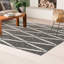 Tapis d'intérieur / extérieur noir / ivoire tissé à la main à plat à motif géométrique River-27399765