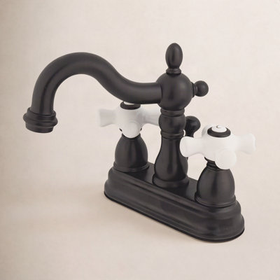 Kingston Brass Heritage Two-Handle 3-Hole Deck Mount 4" Centerset Bathroom Faucet with Plastic Pop-Up