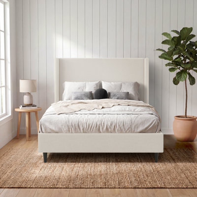 Ana Upholstered Wingback Bed