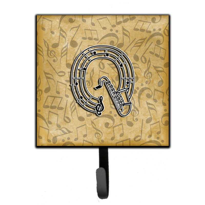 Porte-garde-bûche et crochet mural musical instrument, Q