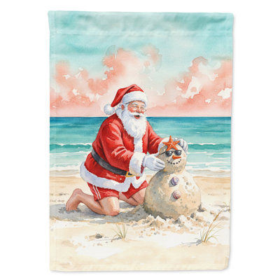 Père Noël construisant un sable, bonhomme de neige, drapeau de la maison de Noël