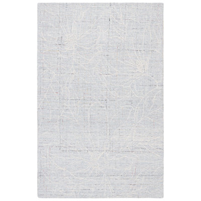 Gullbrand Hand Tufted Wool/Cotton Floral Rug in Ivory/Blue
