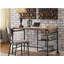 Bureau d'inspiration industrielle avec un plateau en bois noir antique et des roulettes décoratives
