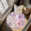 Tapis tressé Winged Blossoms-1625249295
