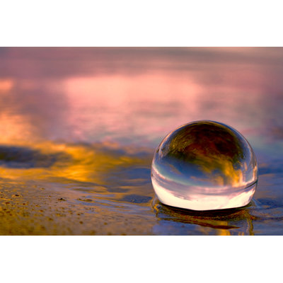 " Glass Ball On Beach " by Mary Wandler