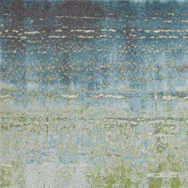 Tapis bleu / vert mousse Leonidas, Rectangle 5 pi 3 po x 7 pi 7 po