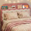 Lit plateforme rose en métal avec tête de lit simple et tiroir de rangement