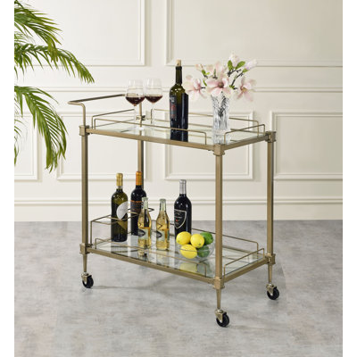 Chariot de service Sanda avec tablettes en verre et finition laiton antique