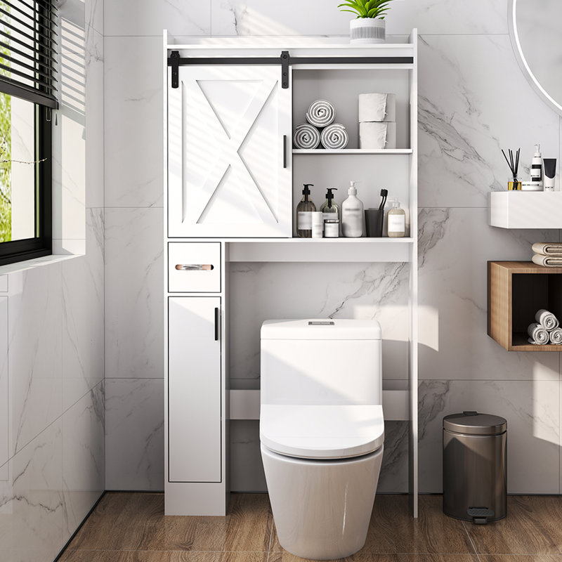 Armoire de rangement au-dessus de la toilette avec porte de grange coulissante