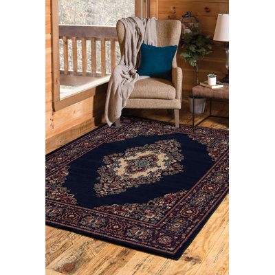 Tapis bleu marine à motif géométrique Argenta