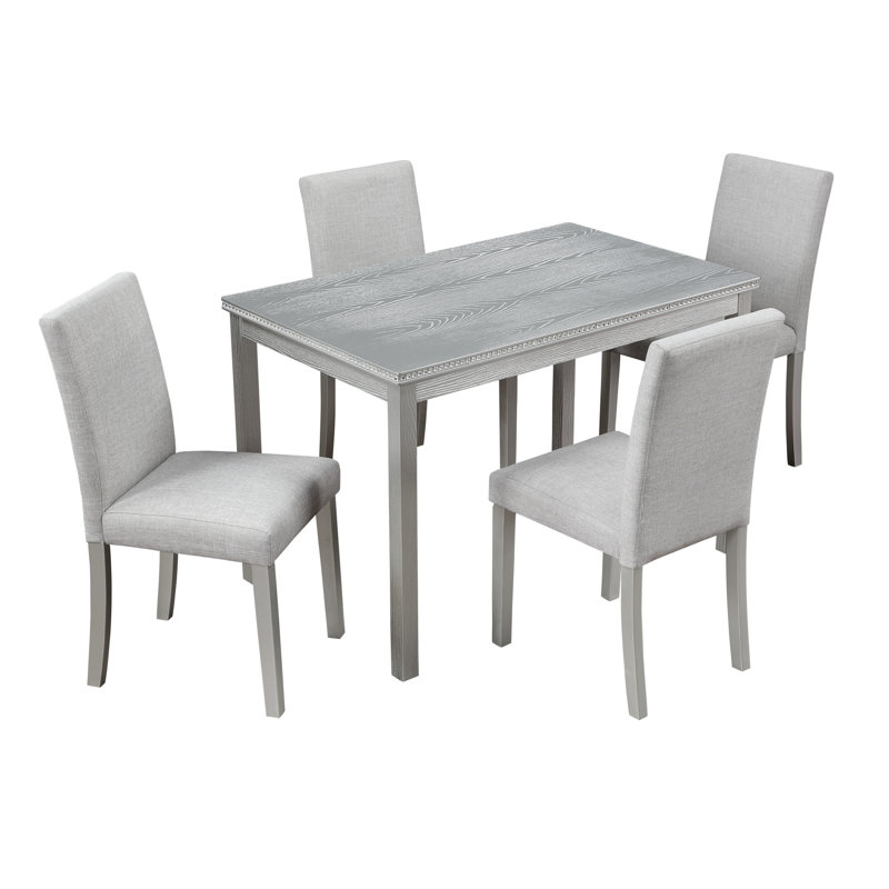 5 tables de salle à manger en bois dans un abat-jour gris argenté, table rectangulaire avec décor en cristal et 4 chaises rembourrées souples pour la décoration