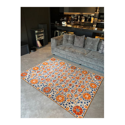 Tapis décoratif multicolore à motif de carreaux orange Suzani