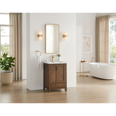 Meuble-lavabo Gela 23,6 po à lavabo simple, couleur brun vieilli épicéa, avec lavabo encastré en céramique blanche.