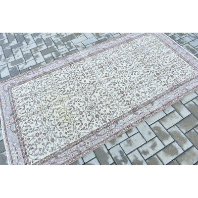 Tapis turc rétro dans des tons riches, idéal pour le décor du salon et de la salle à manger
