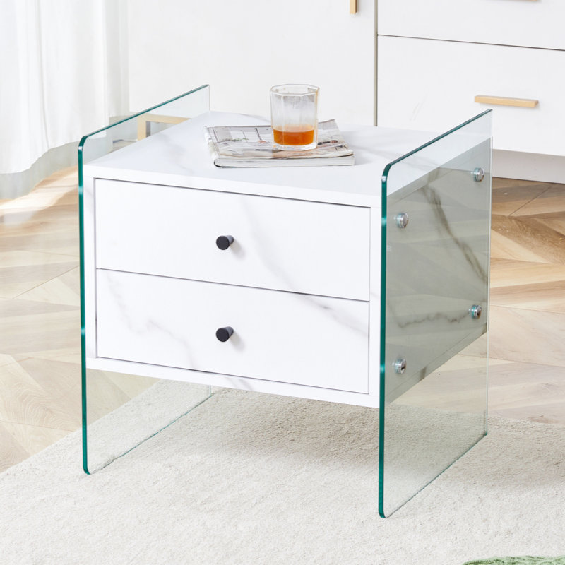 Double-Drawer Bedside Table. The Board Surface Is MDF Sticker, And Both Sides Are Transparent Tempered Glass. The Design Is Simple And Elegant, With Excellent Storage Functions.