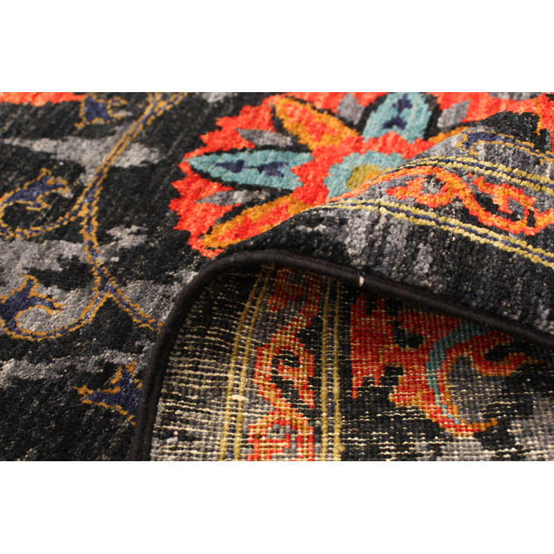 Tapis noir / orange en laine noué à la main Deluna