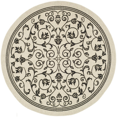 Tapis intérieur / extérieur à motif floral sable / noir Arneshia