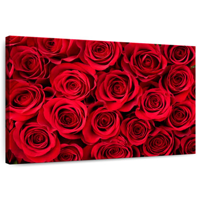 Harnek qui fleurit des roses rouges