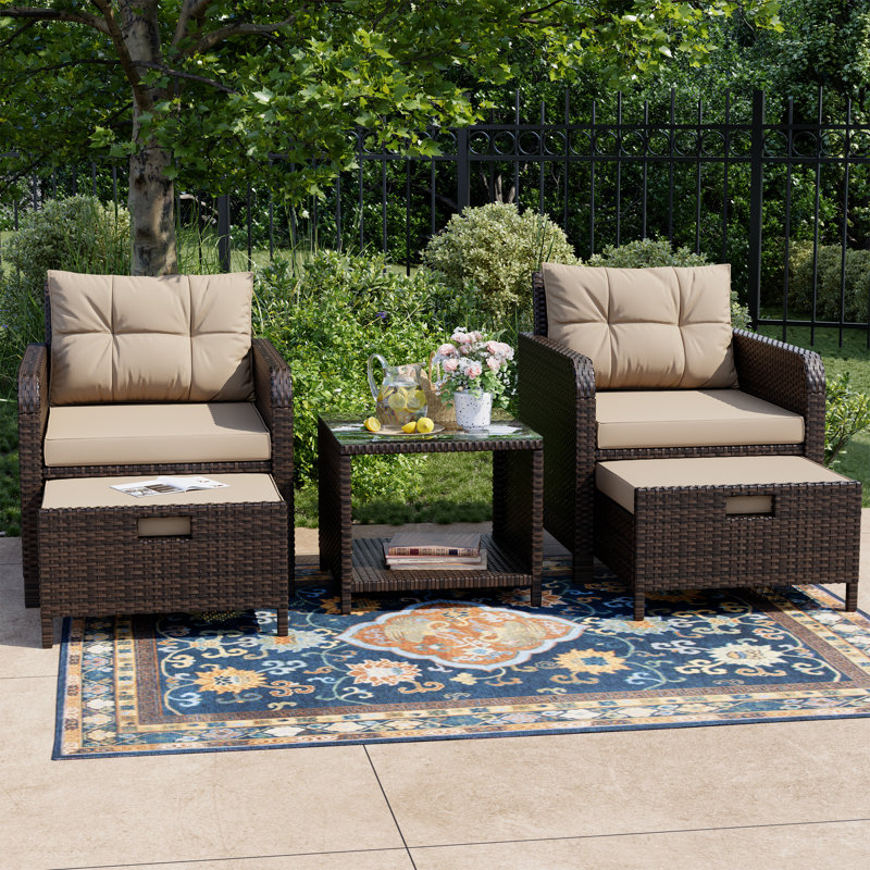 Radostin 5- Piece Rattan Patio Seating Group with Ottomans, Beige/Brown
