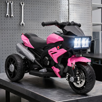 Moto à piles avec klaxon et musique, finition rose chaud, fabrication en acier et en PP, pour tout-petits