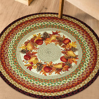 Tapis tissé à la machine en jute orange / vert / brun Ezzell