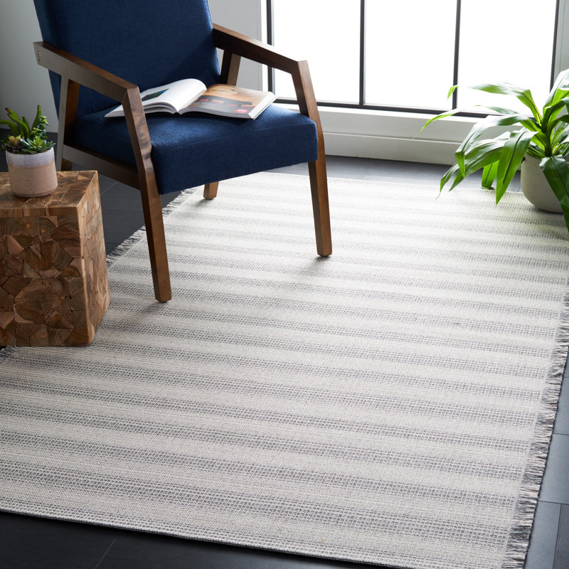 Augustine Ivory/Dark Grey Synthetic Boho-Mod 4'x6' Area Rug