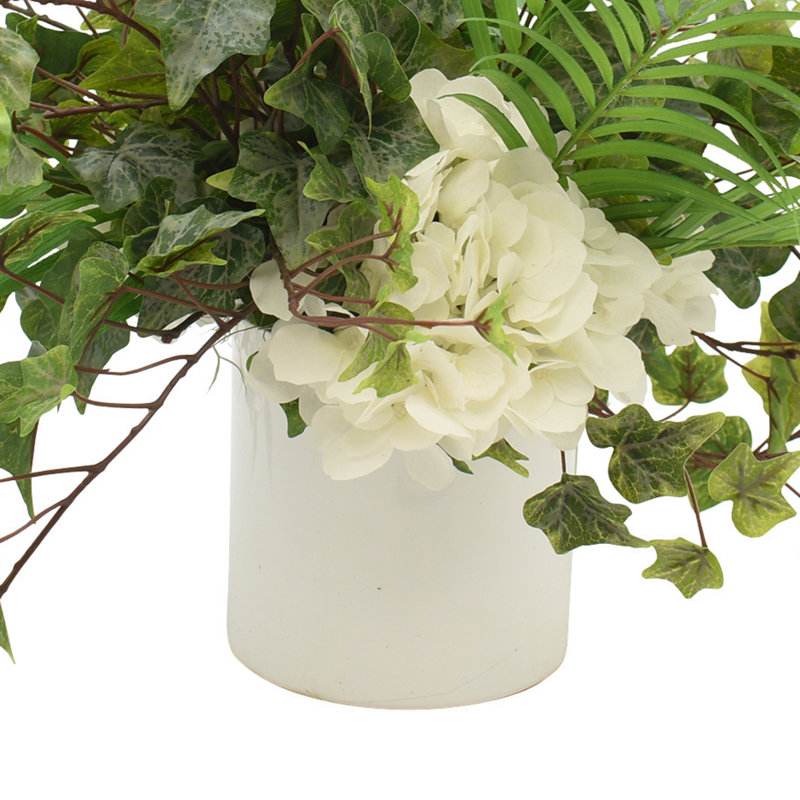 White Hydrangea, Ivy And Fern In Round White Fiberstone Pot