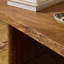 Table basse Nella - Mangue chaude sculptée