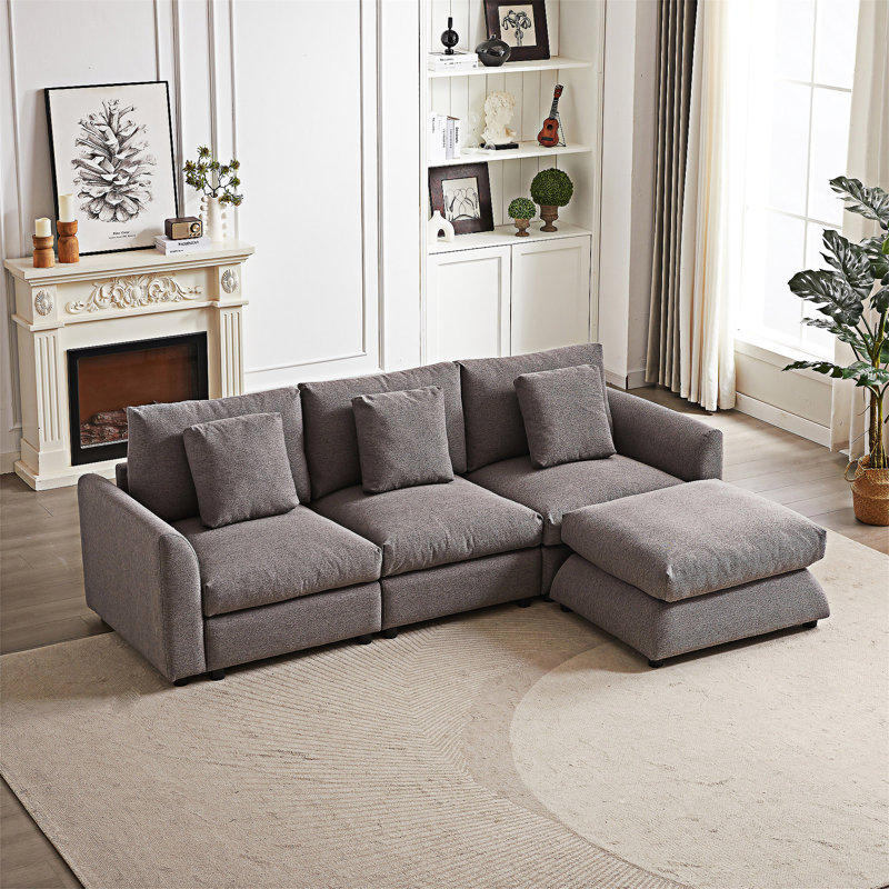 Canapé modulaire avec repose-pieds et trois coussins, Gris