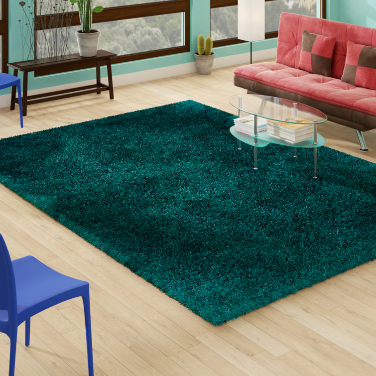 Albritton Hand Tufted Teal Area Rug