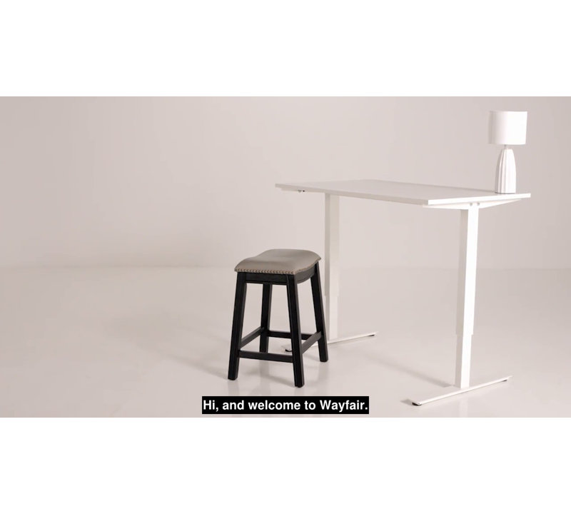 Adjustable Saddle-Style Swivel Counter Stool in Black Leather