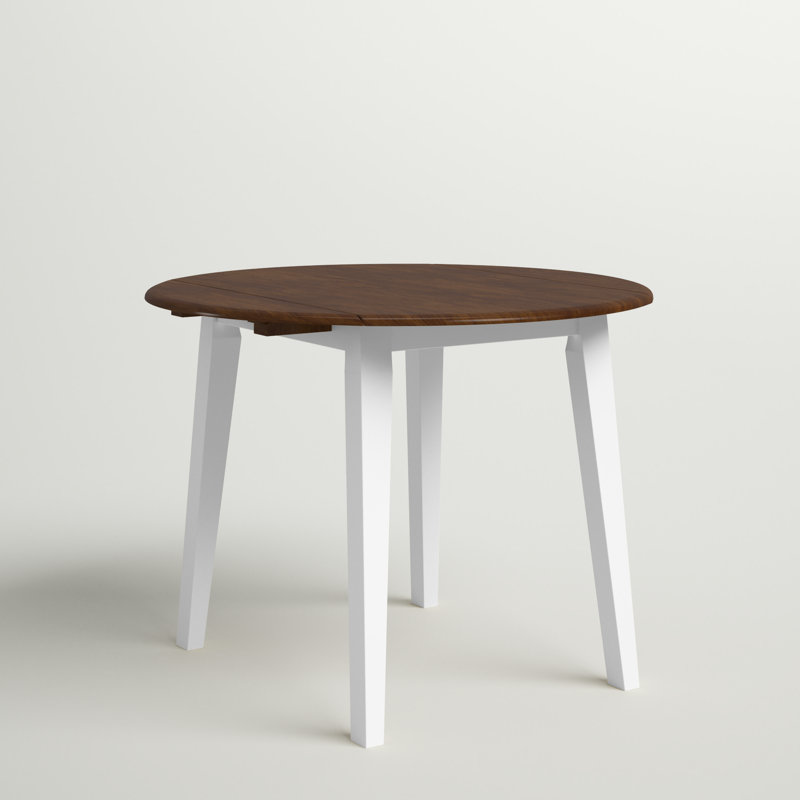 Strongsville Extendable Round Solid Wood Base Dining Table