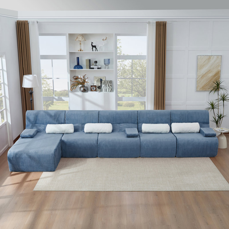 Canapé modulaire surdimensionné en L surdimensionné avec un design modulaire personnalisable et un revêtement en velours côtelé doux, idéal pour les salons modernes