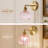 Iron Armed Sconce with Petal-Shaped Glass Shade