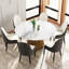 Table de salle à manger ronde en pierre frittée avec base en métal-643618801-648959611
