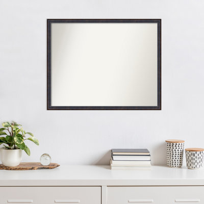 Miroir mural en bois foncé