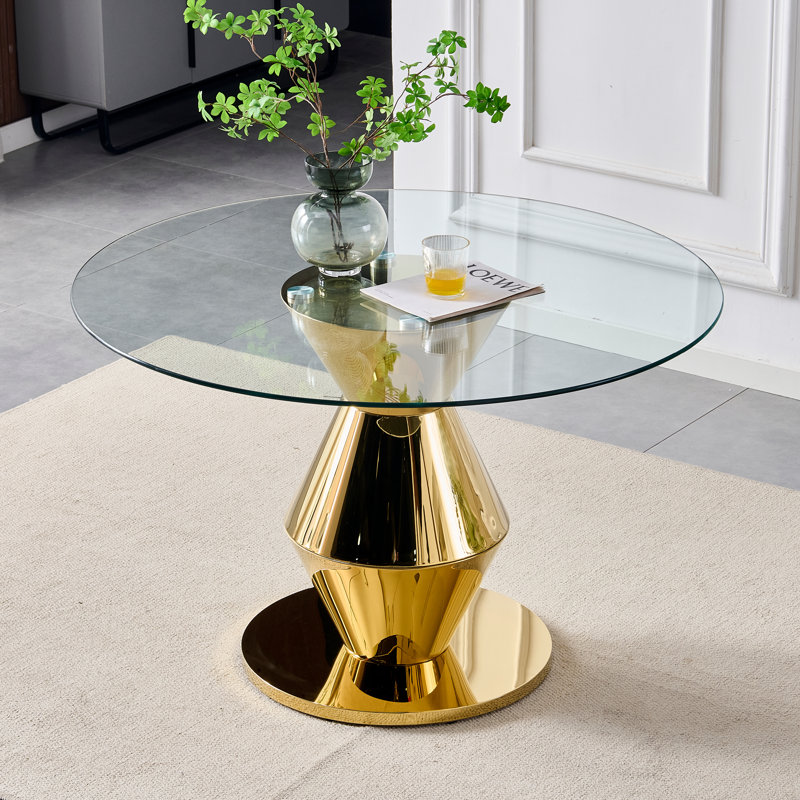 Table de salle à manger ronde de 47,25 pouces de style moderne avec finition miroir dorée, pouvant accueillir 4 à 6 personnes, plateau de table en verre trempé, structure en acier inoxydable.