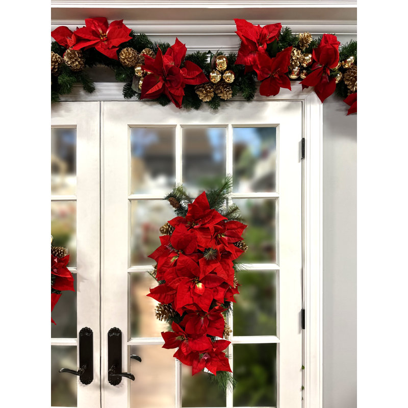 Holiday Swag With Poinsettias, Ornaments And Pinecones