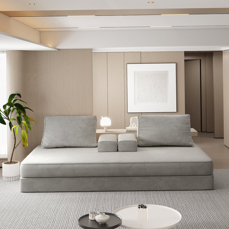 Luxueux canapé Boucle avec mousse pelucheuse multi-densité, parfait pour le confort et le style dans les intérieurs modernes ou traditionnels.