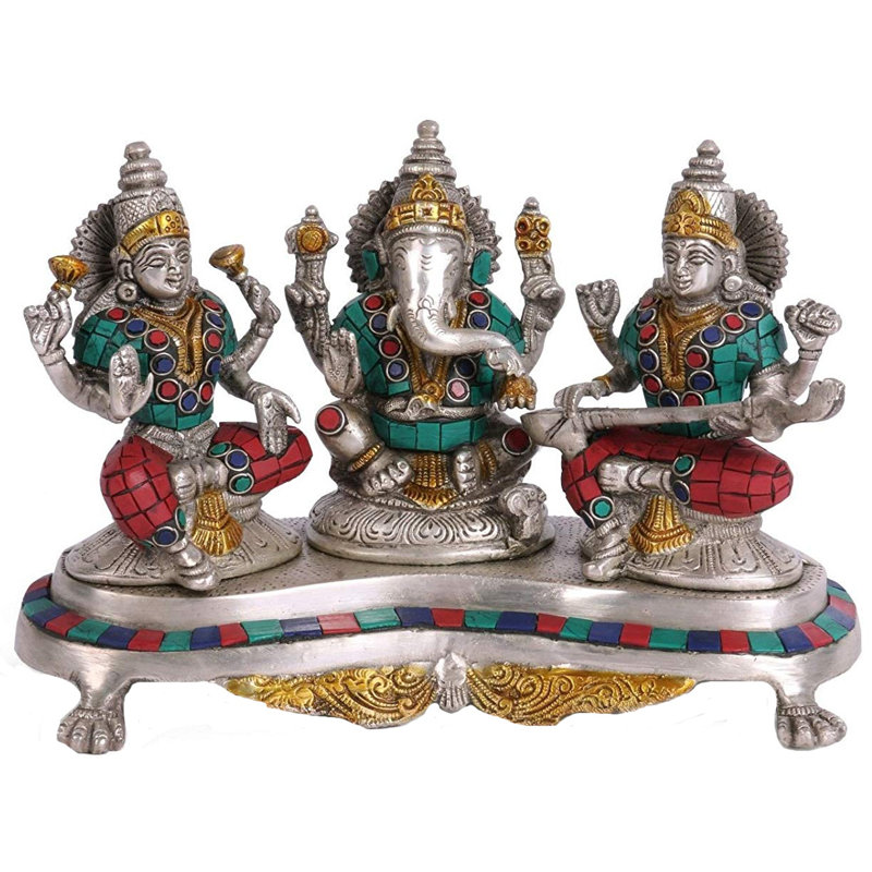Lord Ganesha avec la déesse Lakshmi et Saraswati