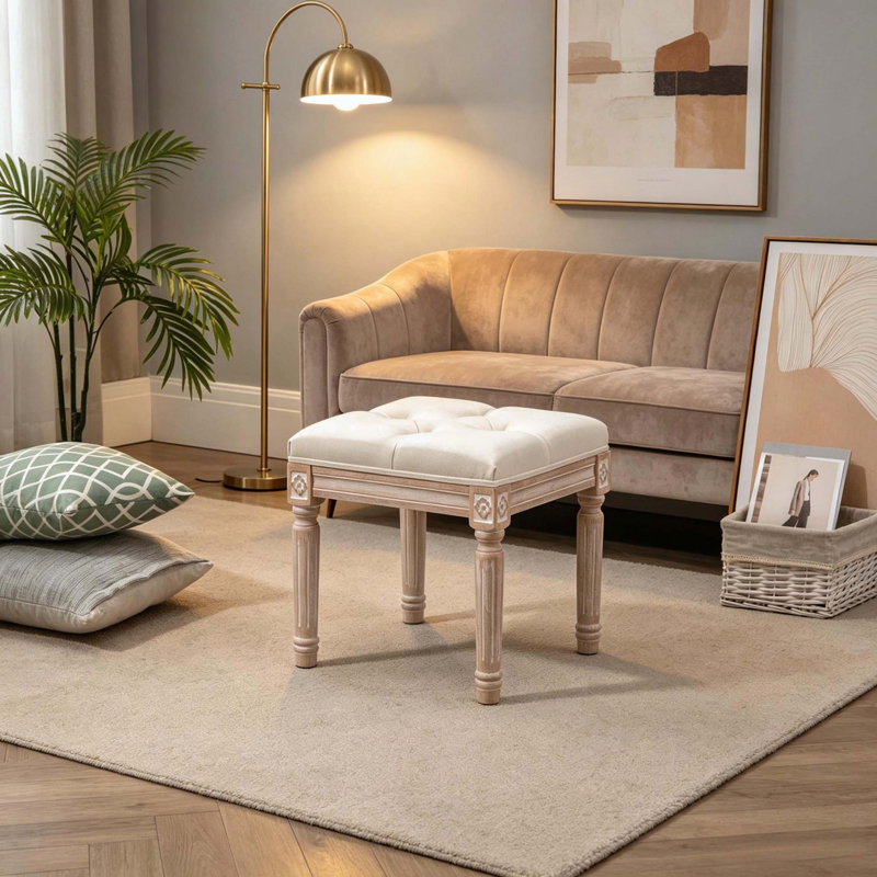 Élégant tabouret d'appoint capitonné avec pieds en bois sculpté
