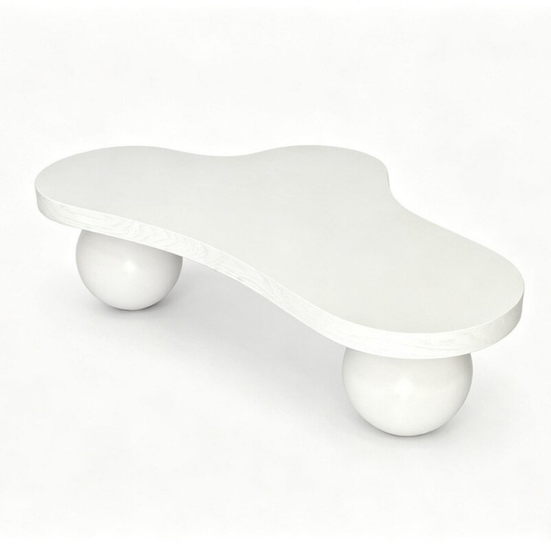 Table basse moderne en forme de nuage avec pieds sculpturaux en forme de boule