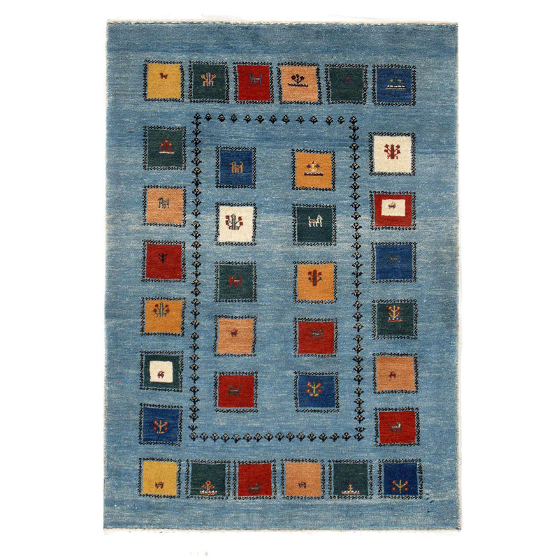 Mckinely Wool Geometric Area Rug in Blue
